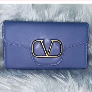 Elegant Blue Clutch with Gold Detail